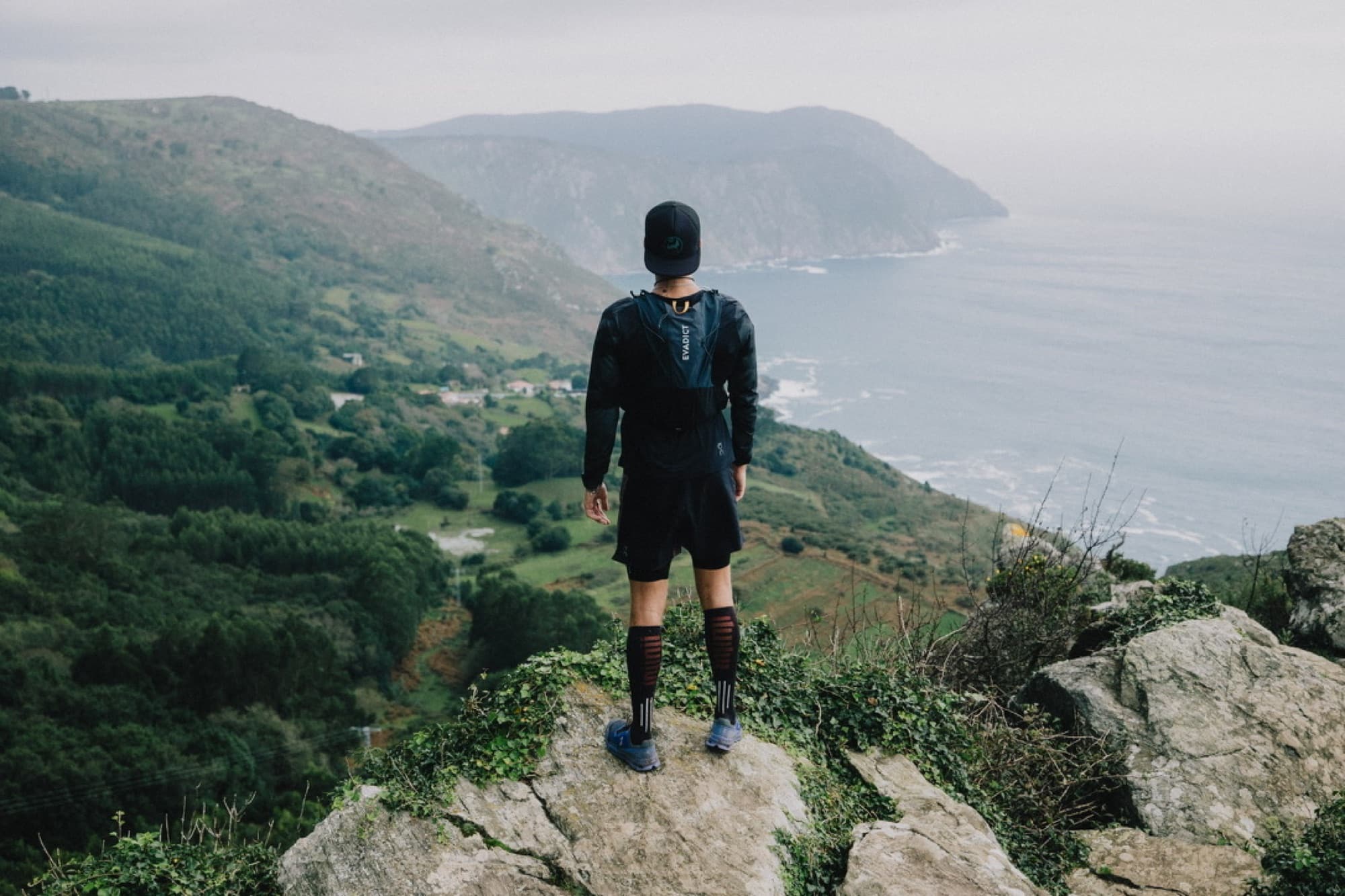 Jonathan standing on a headland looking out over the Atlantic.